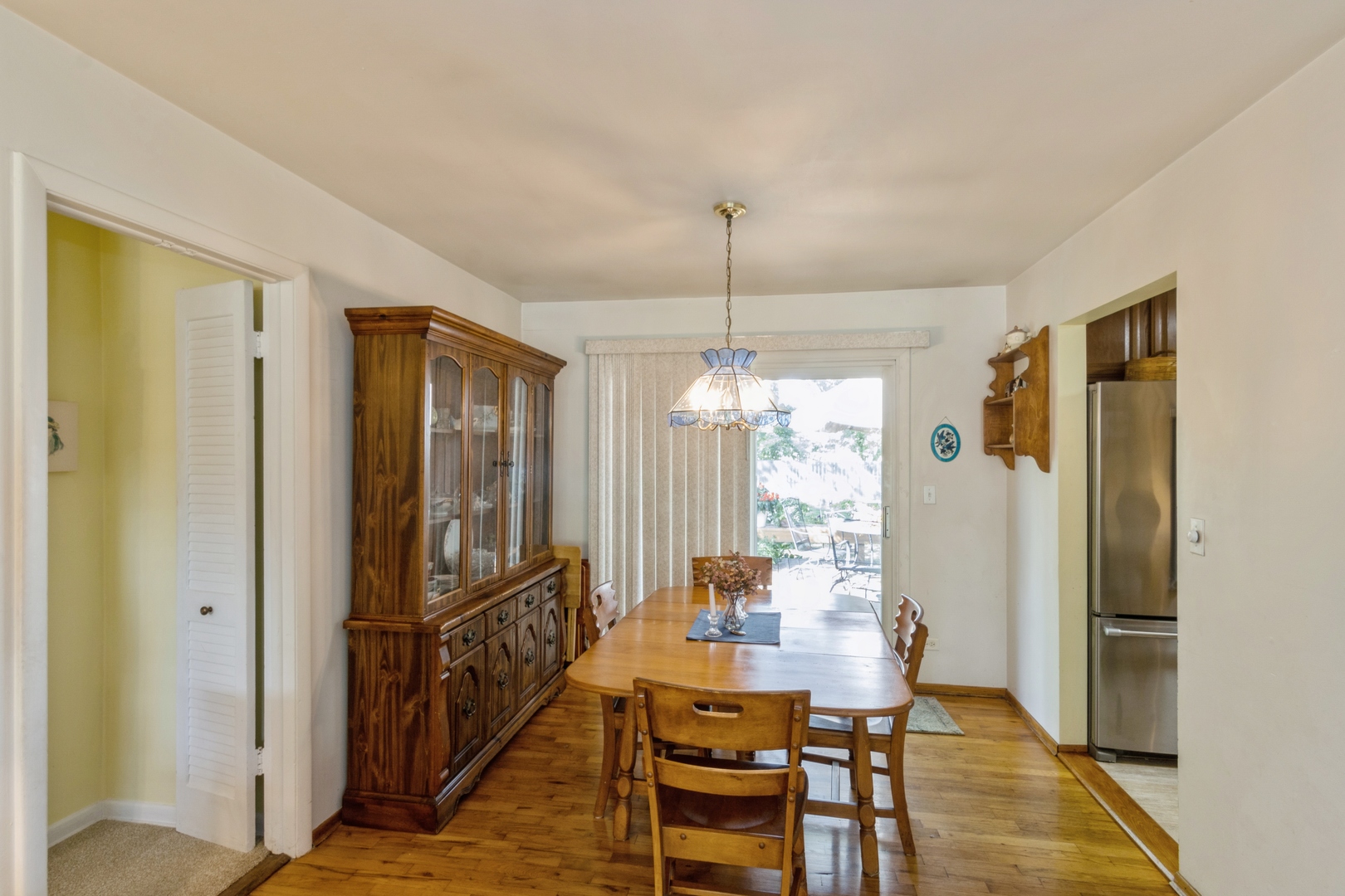 540 Newark Lane Hoffman Estates, IL 60169 - Photo 3 of 10 a view of a dining room with furniture window and wooden floor