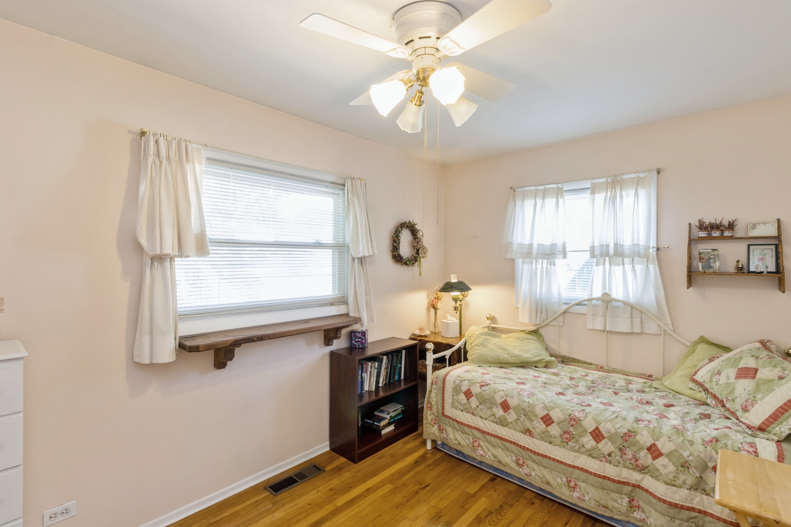 540 Newark Lane Hoffman Estates, IL 60169 - Photo 8 of 10 a bedroom with a bed and a window