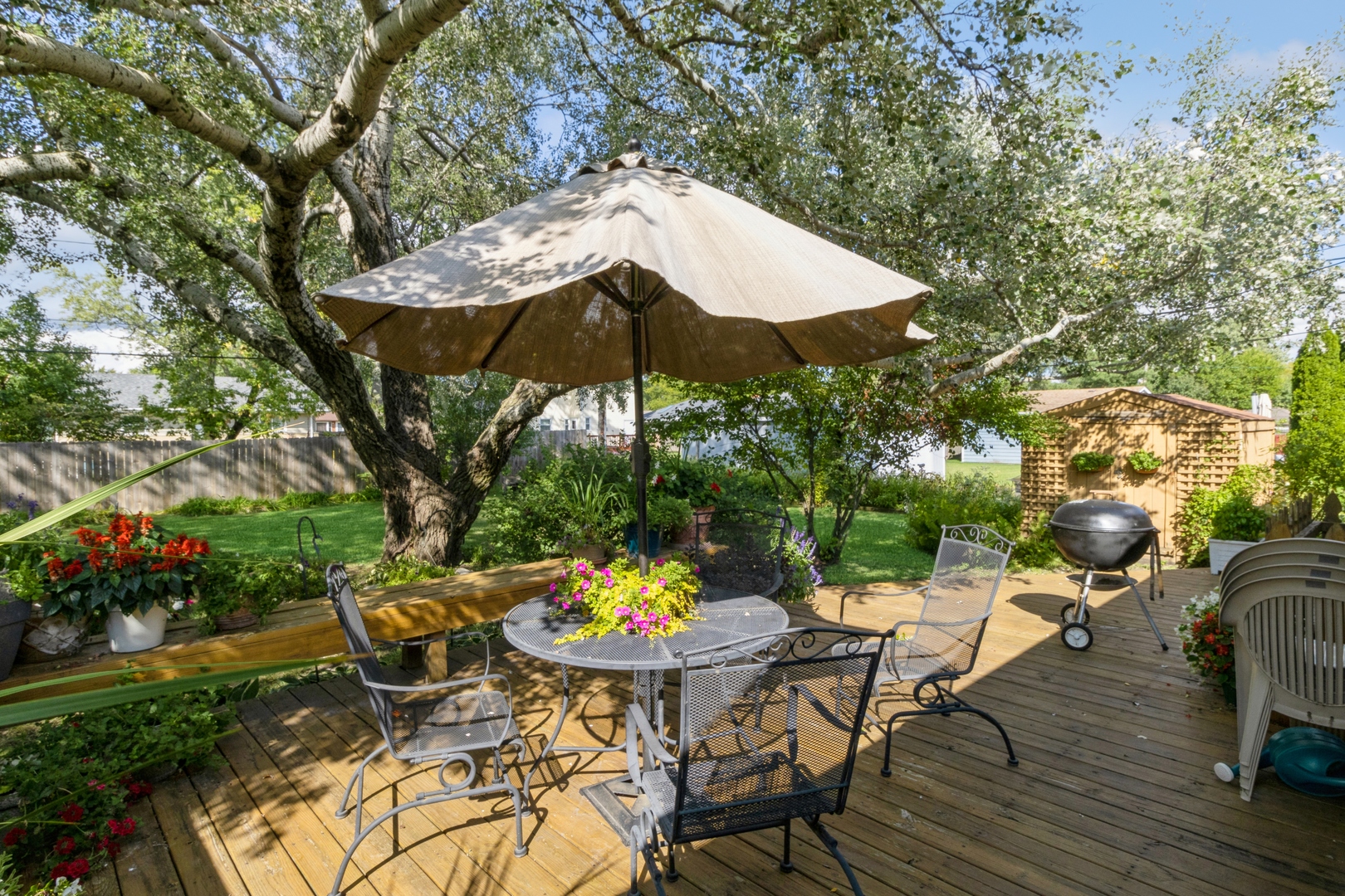540 Newark Lane Hoffman Estates, IL 60169 - Photo 9 of 10 an outdoor space with furniture and umbrella