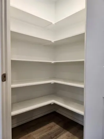 a storage room with washer and dryer