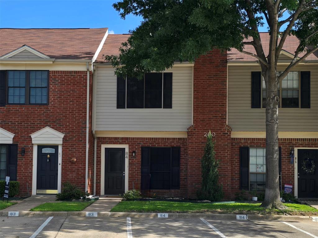 200 Samuel Boulevard, Unit 4 Coppell, TX 75019 - Photo 1 of 1 a front view of a house