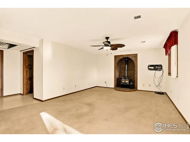 a view of a livingroom with a fireplace