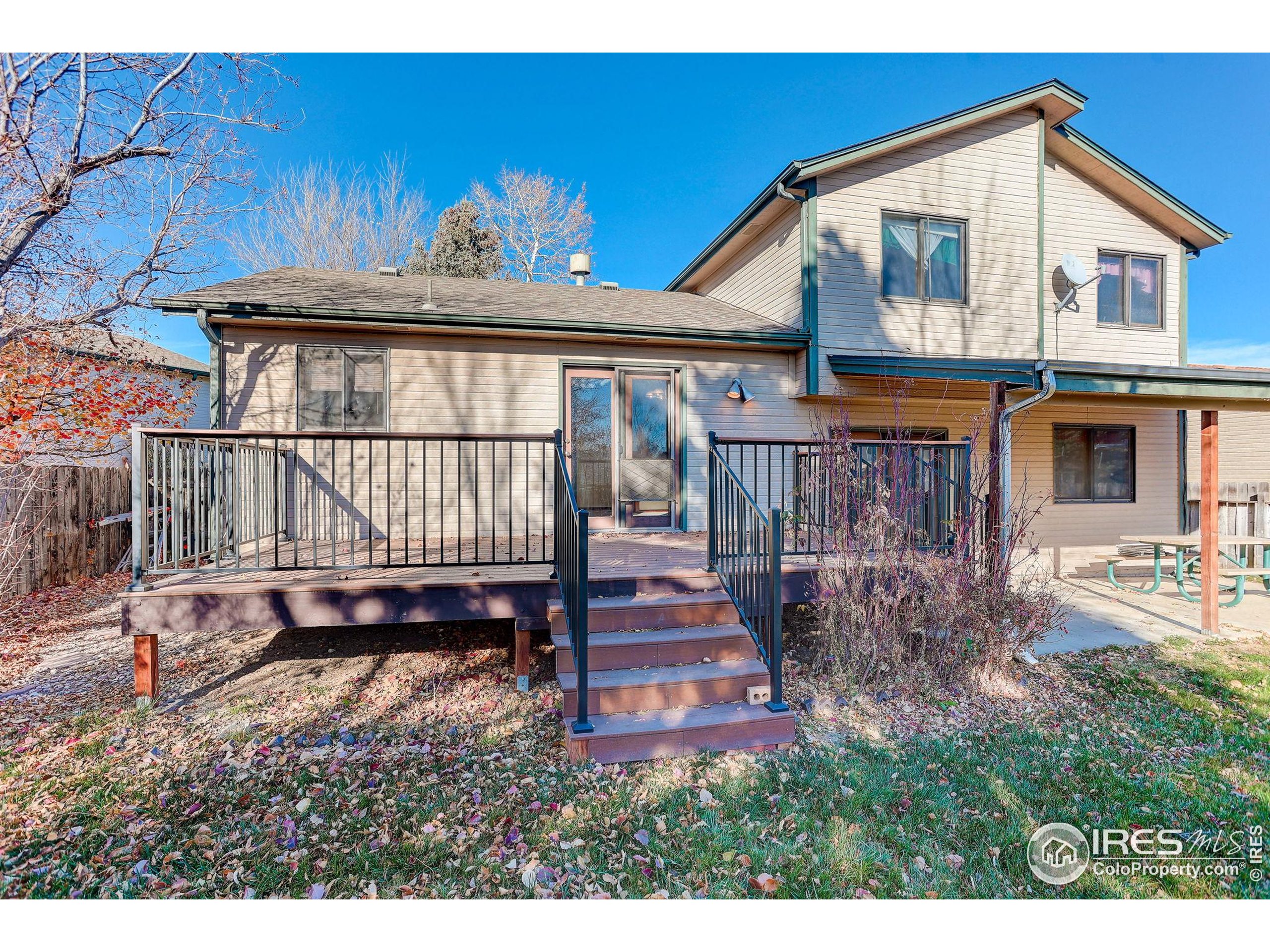 809 Jay Place Berthoud, CO 80513 - Photo 26 of 31 a front view of a house with a yard