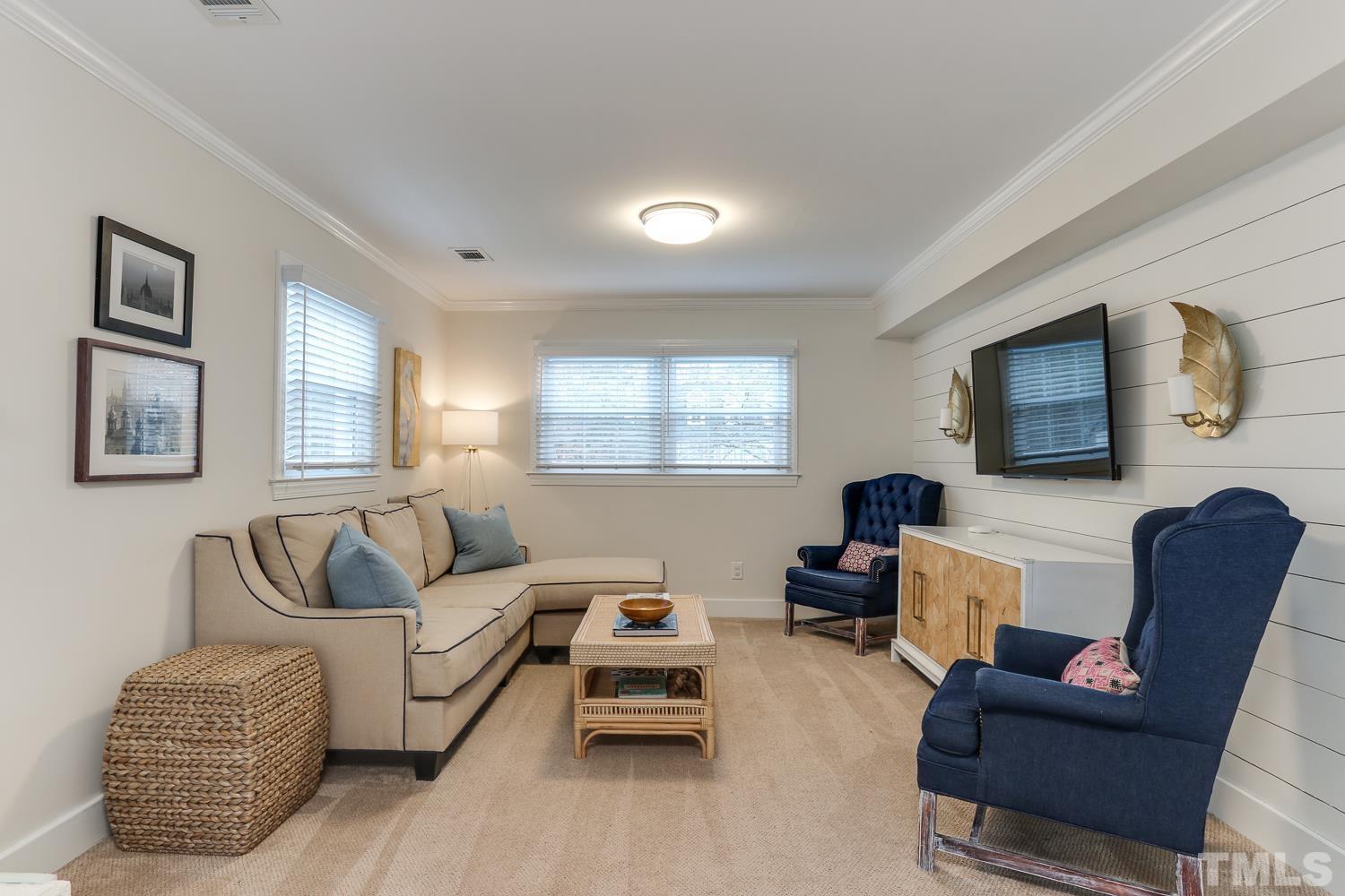 4516 Keswick Drive Raleigh, NC 27609 - Photo 22 of 31 a living room with furniture