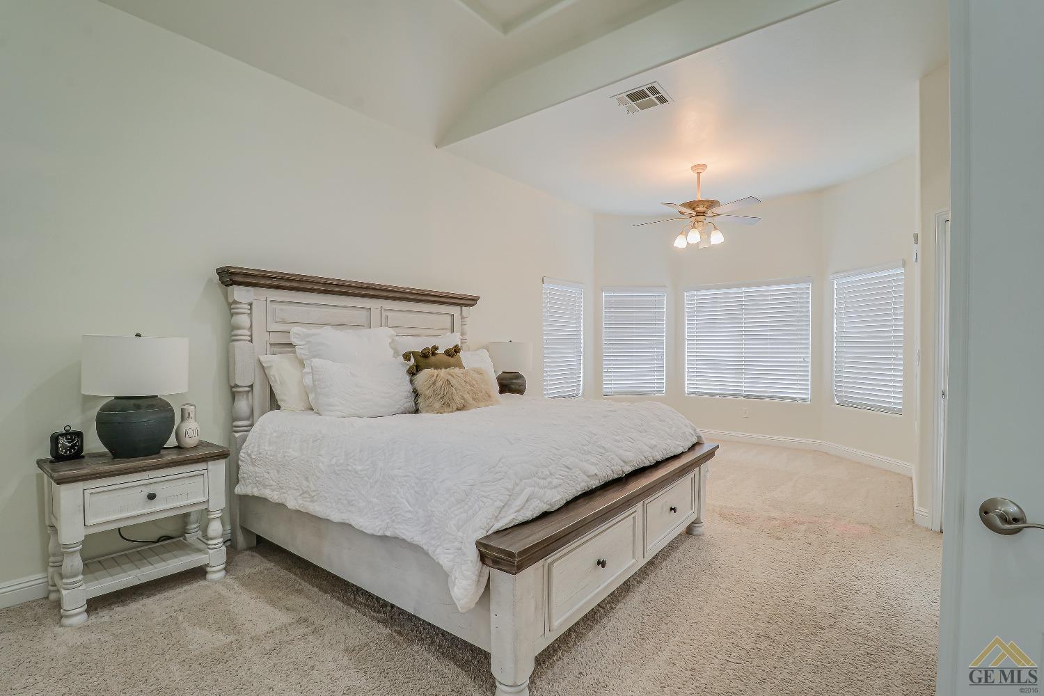 Undisclosed Address Bakersfield, CA 93314 - Photo 20 of 30 a bedroom with a bed and window