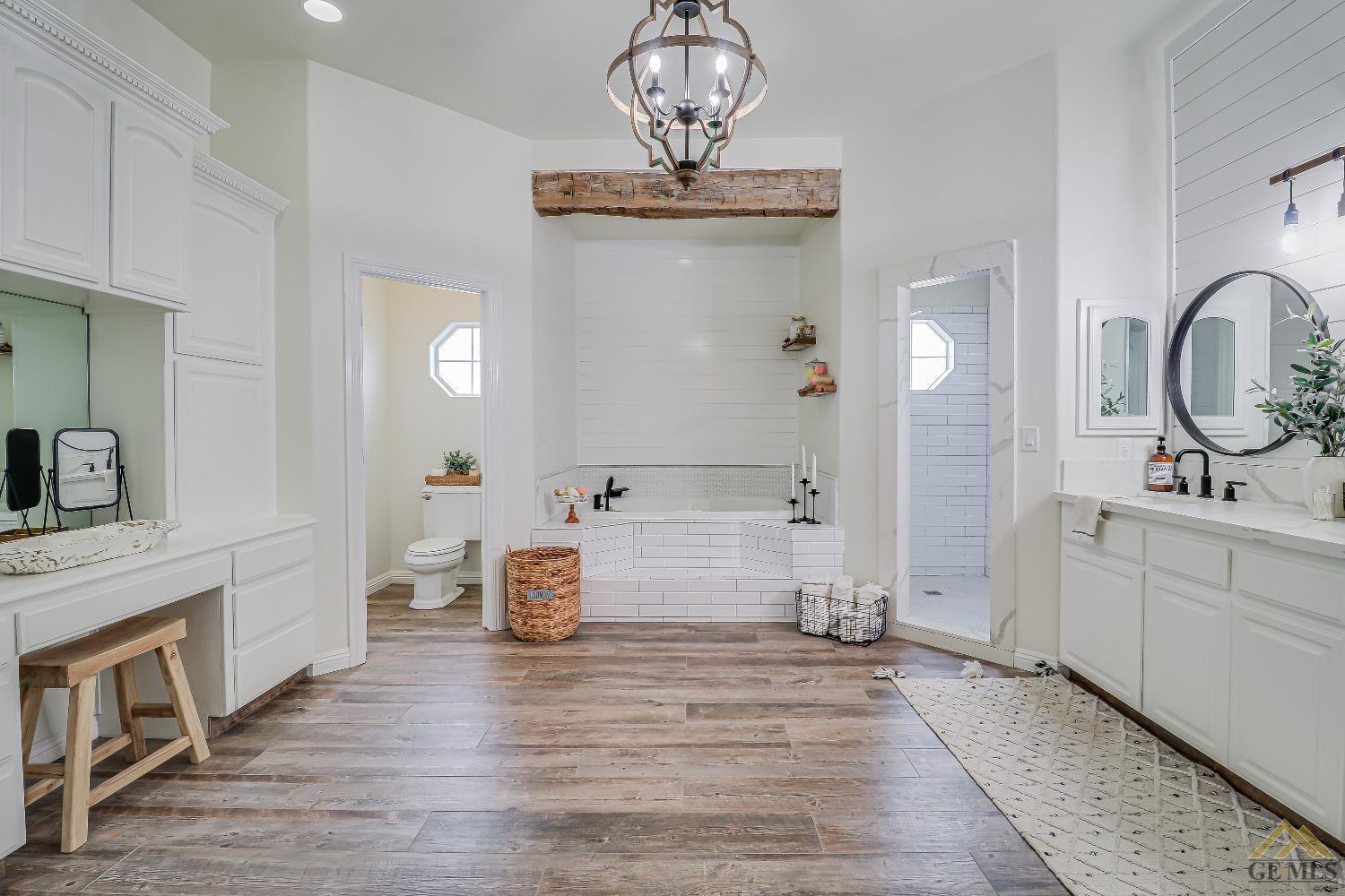 Undisclosed Address Bakersfield, CA 93314 - Photo 22 of 30 a view of a kitchen with a sink and cabinets