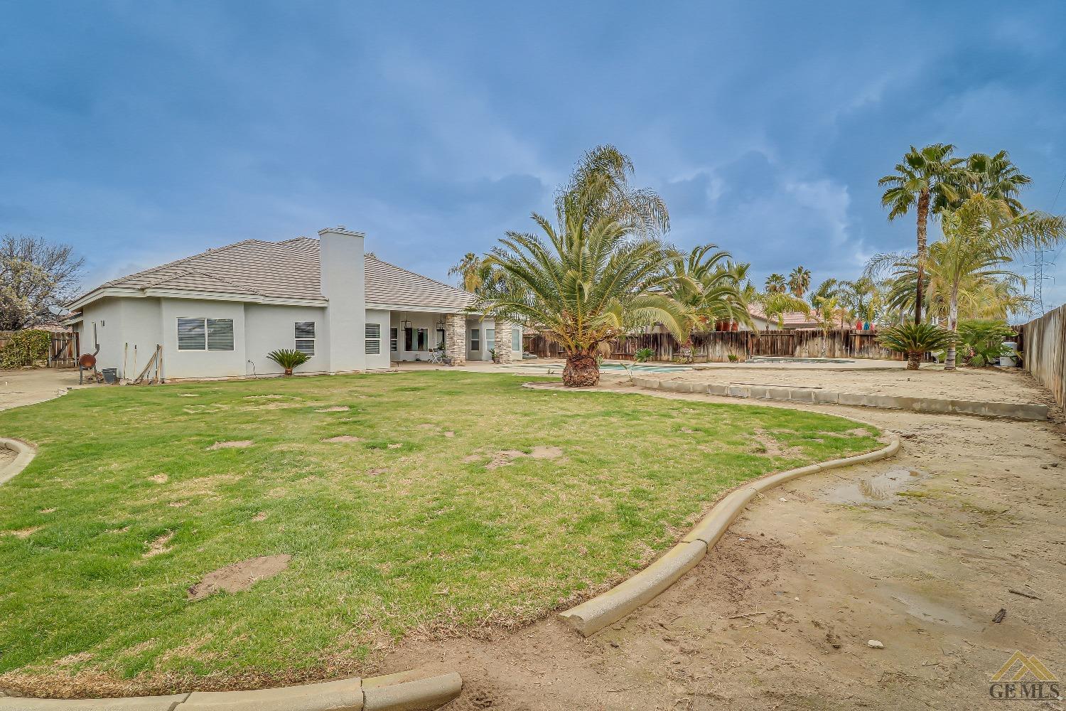 Undisclosed Address Bakersfield, CA 93314 - Photo 29 of 30 a view of a house with a big yard