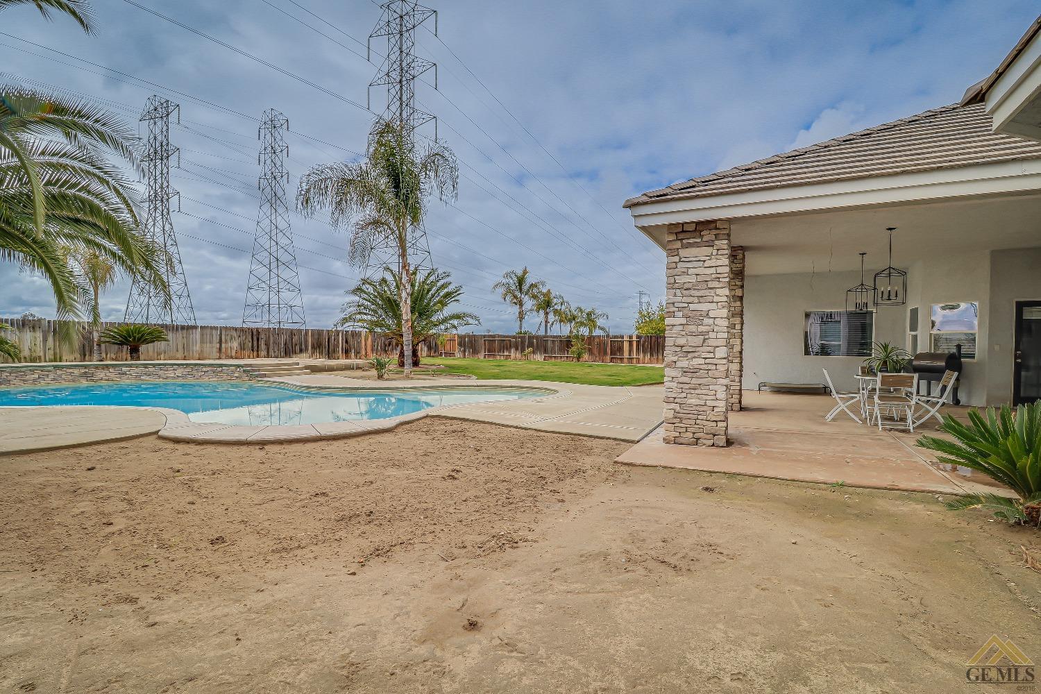 Undisclosed Address Bakersfield, CA 93314 - Photo 30 of 30 a view of a house with a park