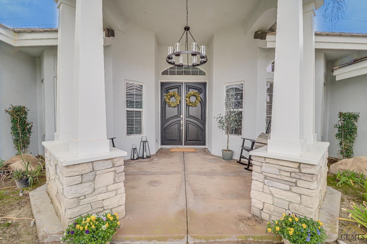 Undisclosed Address Bakersfield, CA 93314 - Photo 4 of 30 front view of a house with a chandelier