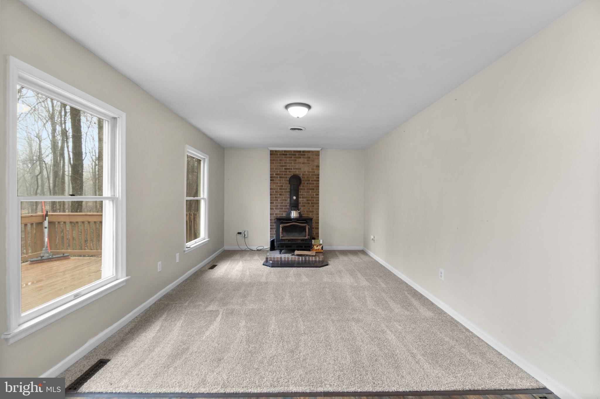 4525 Roop Road Mount Airy, MD 21771 - Photo 18 of 49 Family Room with Woodburning Stove