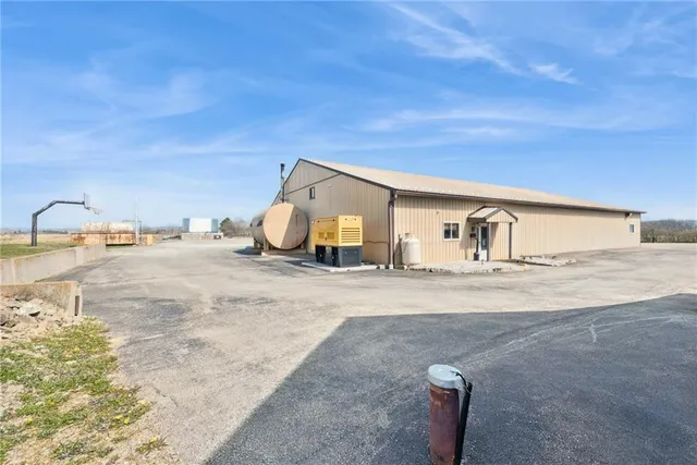 a bathroom with a sink mirror and vanity