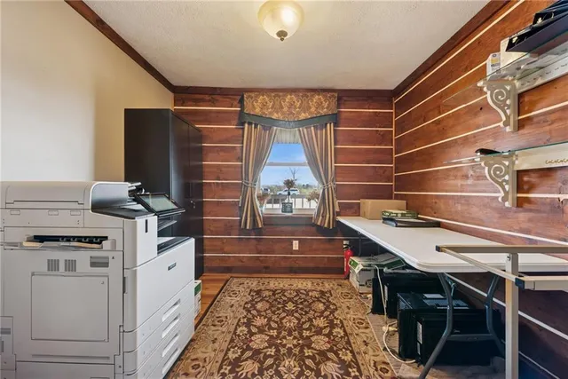 a kitchen with stainless steel appliances a sink and cabinets