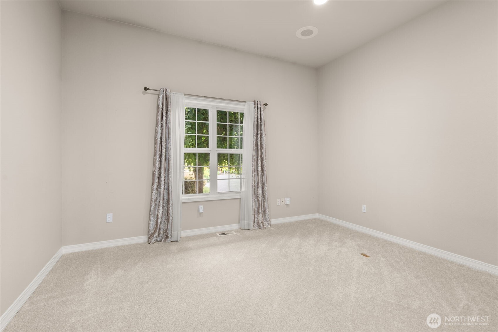 9609 346th Street South Roy, WA 98580 - Photo 19 of 37 an empty room with windows