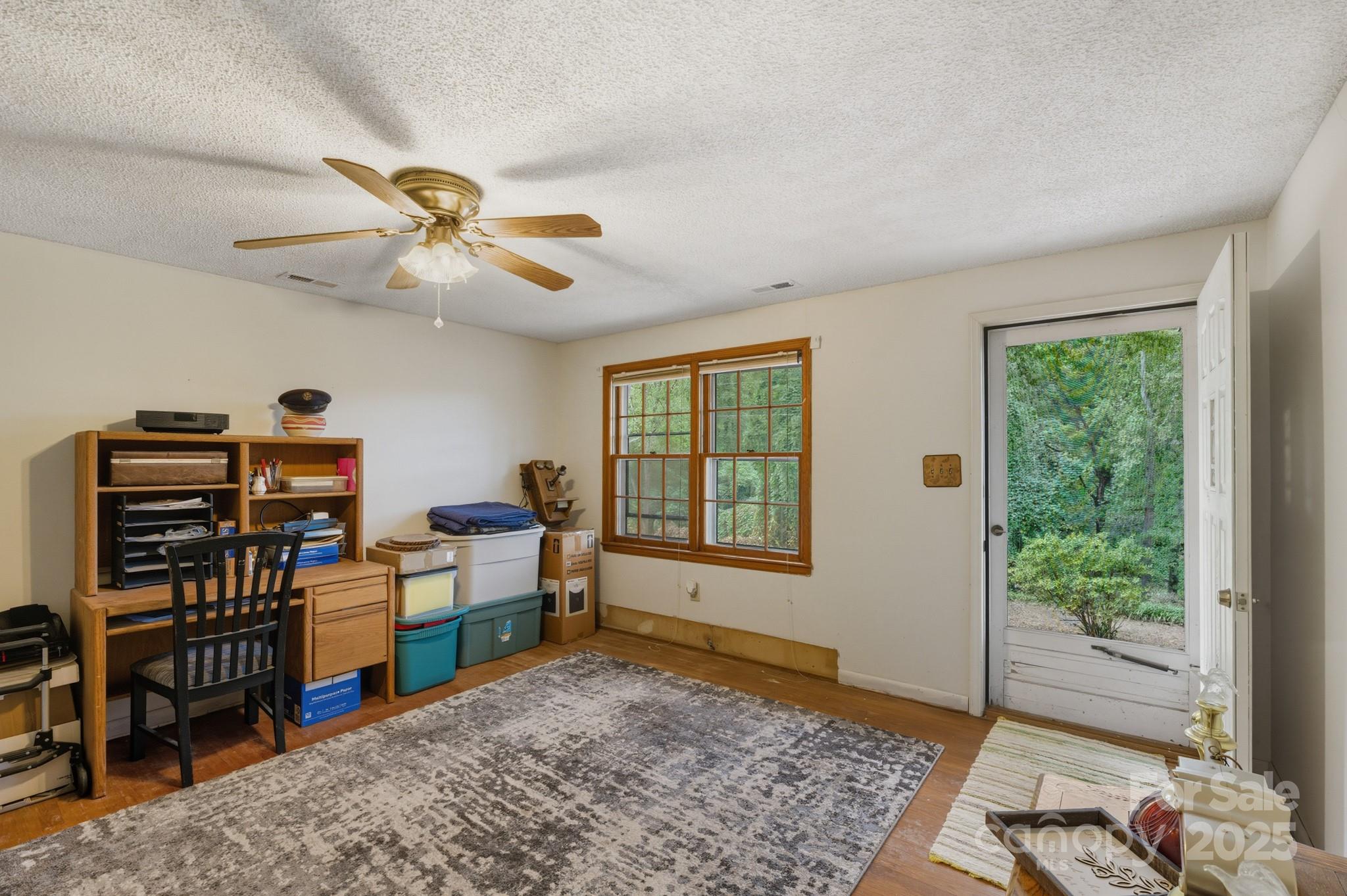 636 Maple Creek Road Rutherfordton, NC 28139 - Photo 12 of 17 a bedroom with furniture and a window