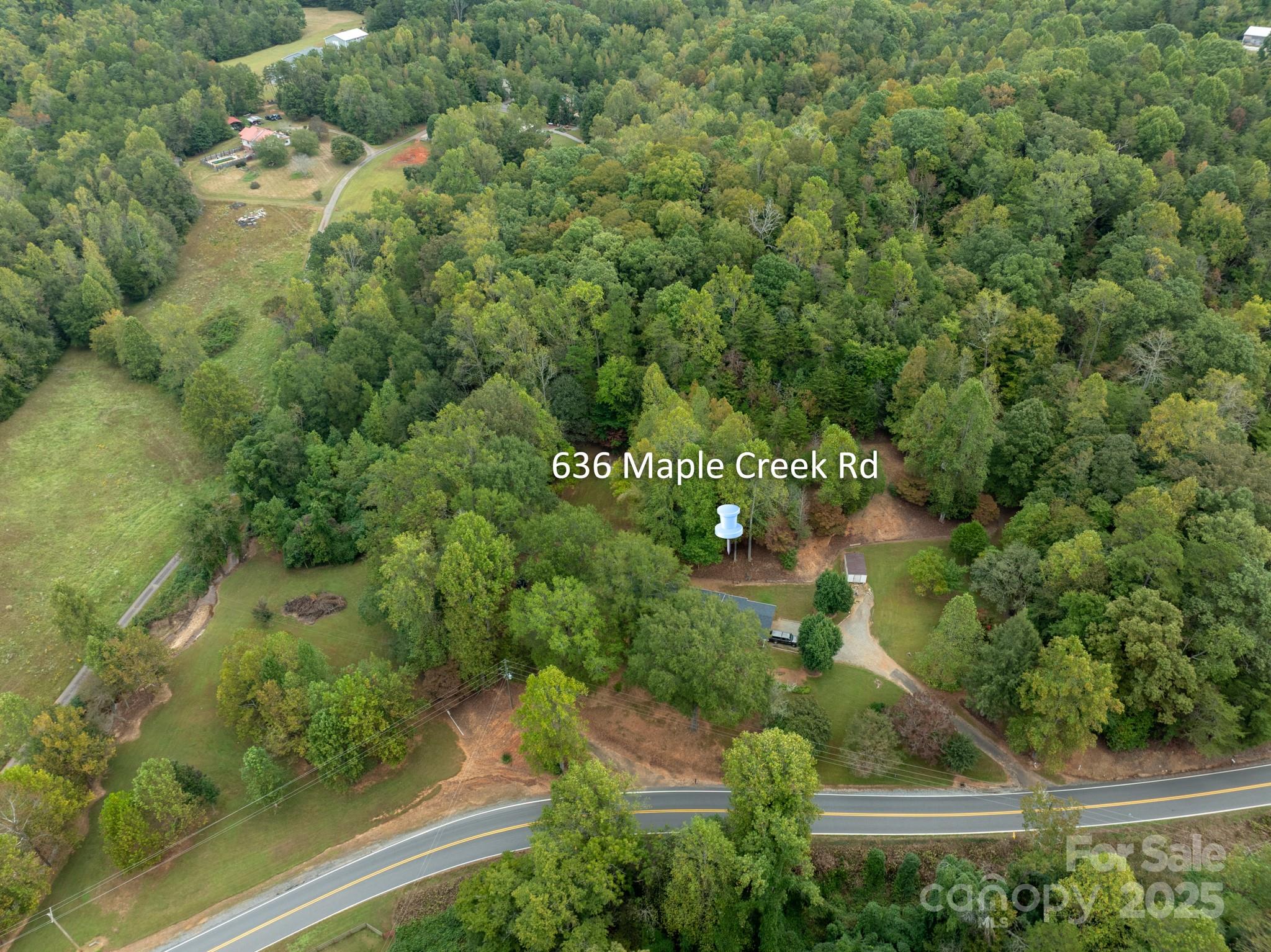 636 Maple Creek Road Rutherfordton, NC 28139 - Photo 16 of 17 an aerial view of residential house with outdoor space and trees all around