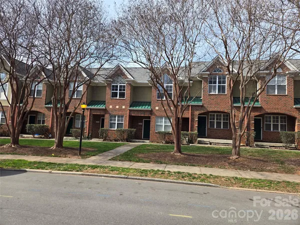 a front view of a building with street view