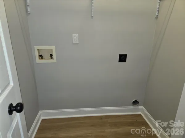 a view of a room with rack on the wall