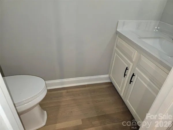 a bathroom with a sink and toilet