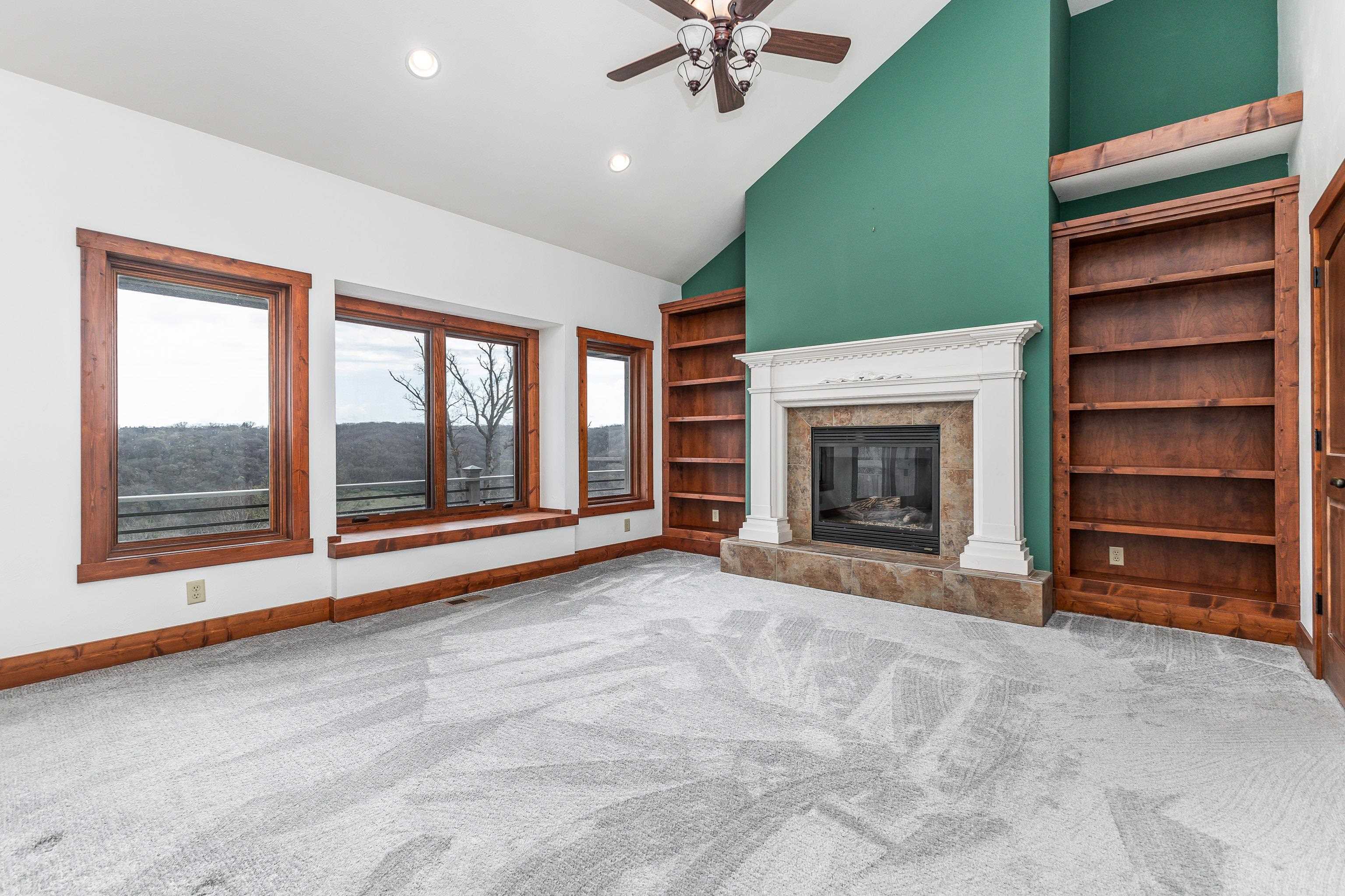 8616 Fisher Road Hanover, IL 61041 - Photo 31 of 74 a view of an empty room with a fireplace and a window