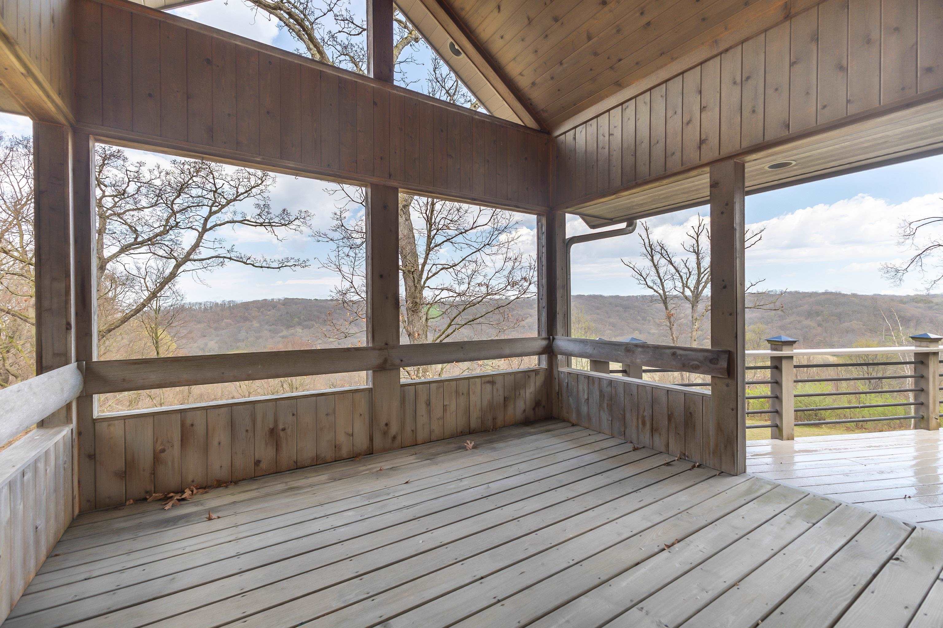 8616 Fisher Road Hanover, IL 61041 - Photo 34 of 74 a view of an outdoor space with wooden floor and city view