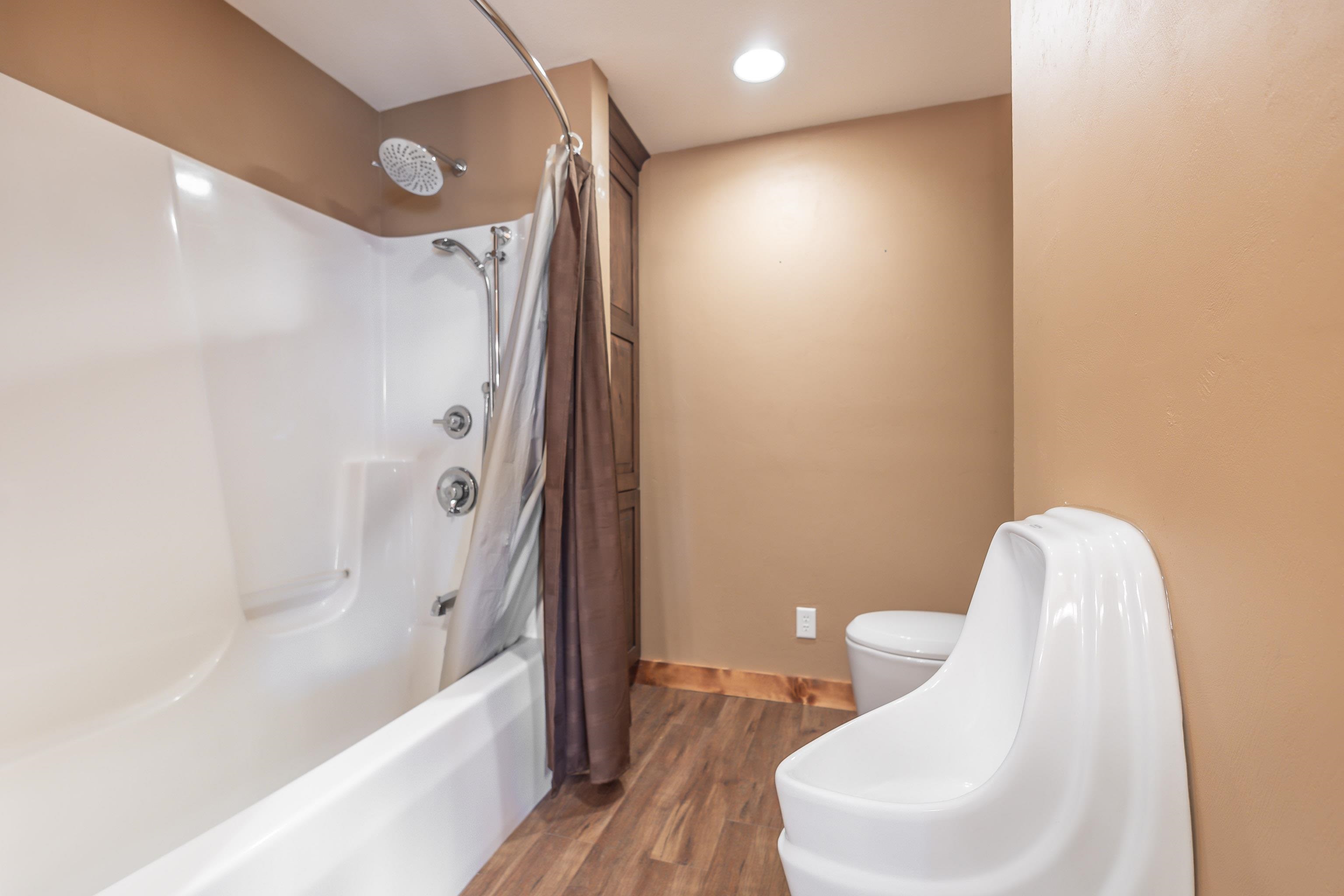 8616 Fisher Road Hanover, IL 61041 - Photo 60 of 74 a bathroom with a sink a toilet and bathtub