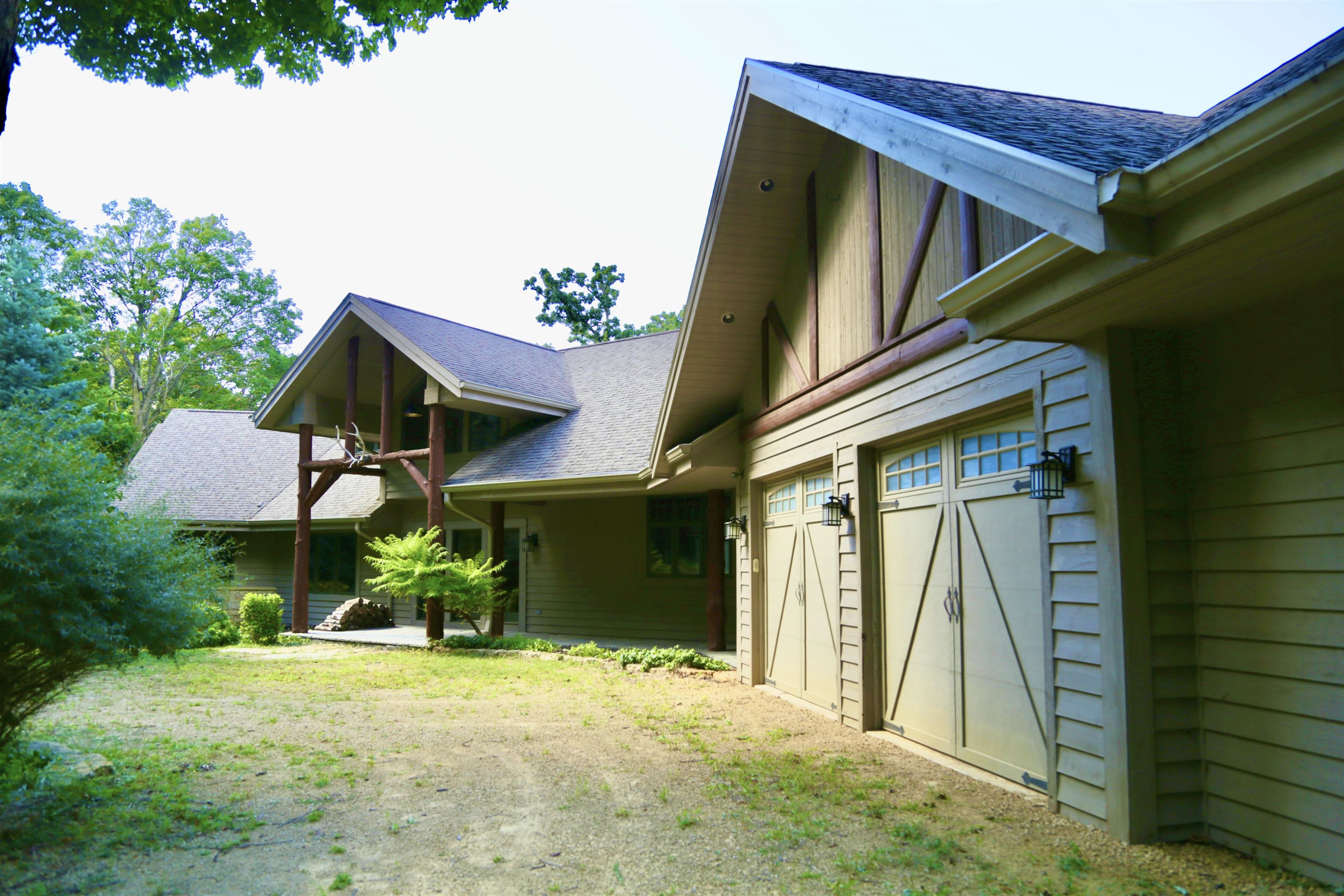 8616 Fisher Road Hanover, IL 61041 - Photo 6 of 74 a front view of a house with a yard