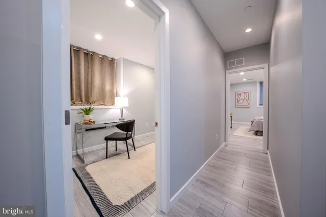 a bedroom with a bed and a cabinets