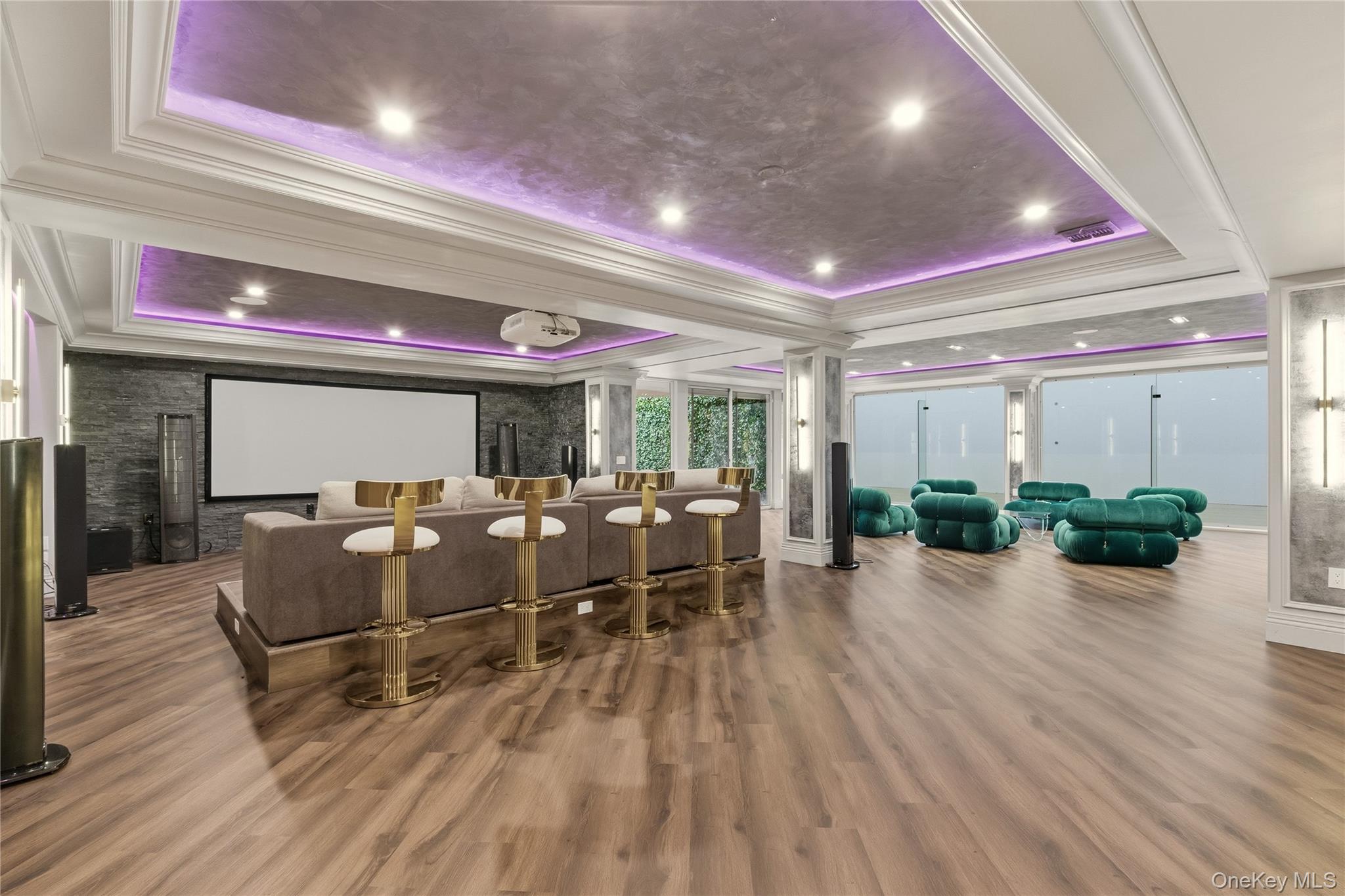 55 Coves Run Syosset, NY 11791 - Photo 41 of 50 a living room with lots of furniture and wooden floor