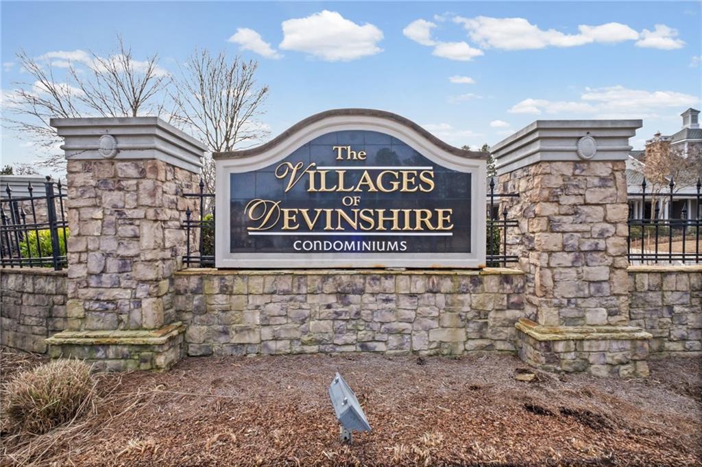 238 Edinburgh Court Alpharetta, GA 30004 - Photo 17 of 20 a sign broad in front of a brick building