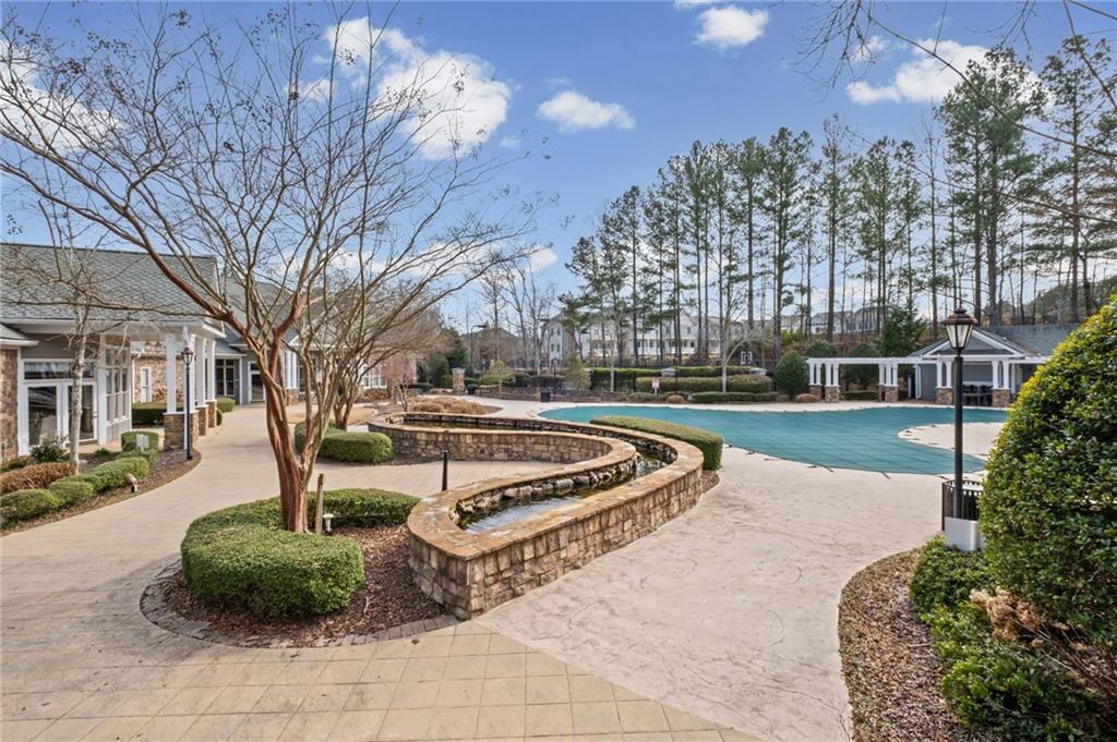 238 Edinburgh Court Alpharetta, GA 30004 - Photo 19 of 20 a view of a garden with a fountain