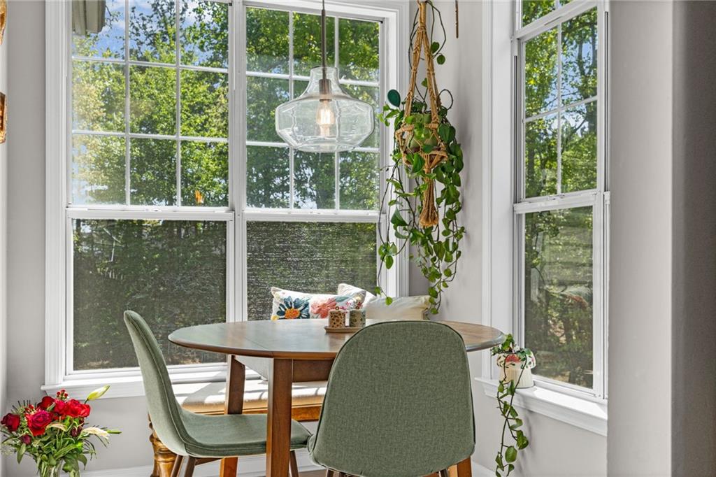 238 Edinburgh Court Alpharetta, GA 30004 - Photo 7 of 20 a view of a dining room with furniture window and outside view