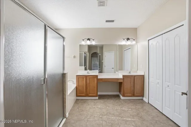 a bathroom with a sink a toilet and a bathtub