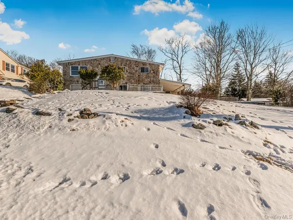 a view of a yard with snow