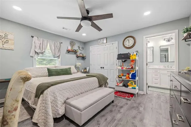 a bedroom with a bed furniture and a window