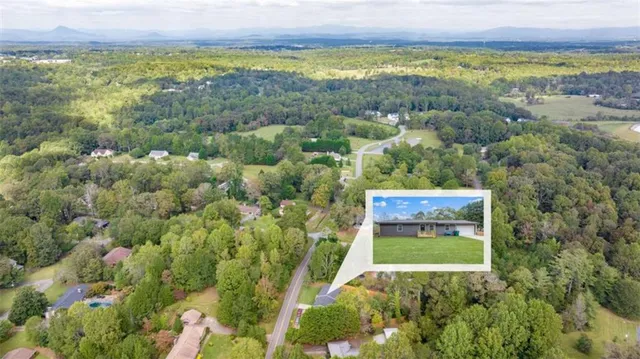 a view of a city with an ocean