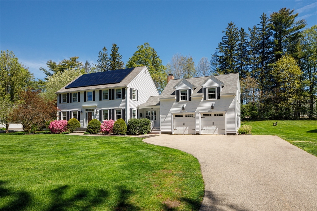 53 South Hampton Road Amesbury, MA 01913 - Photo 2 of 39 front view of a house with a yard
