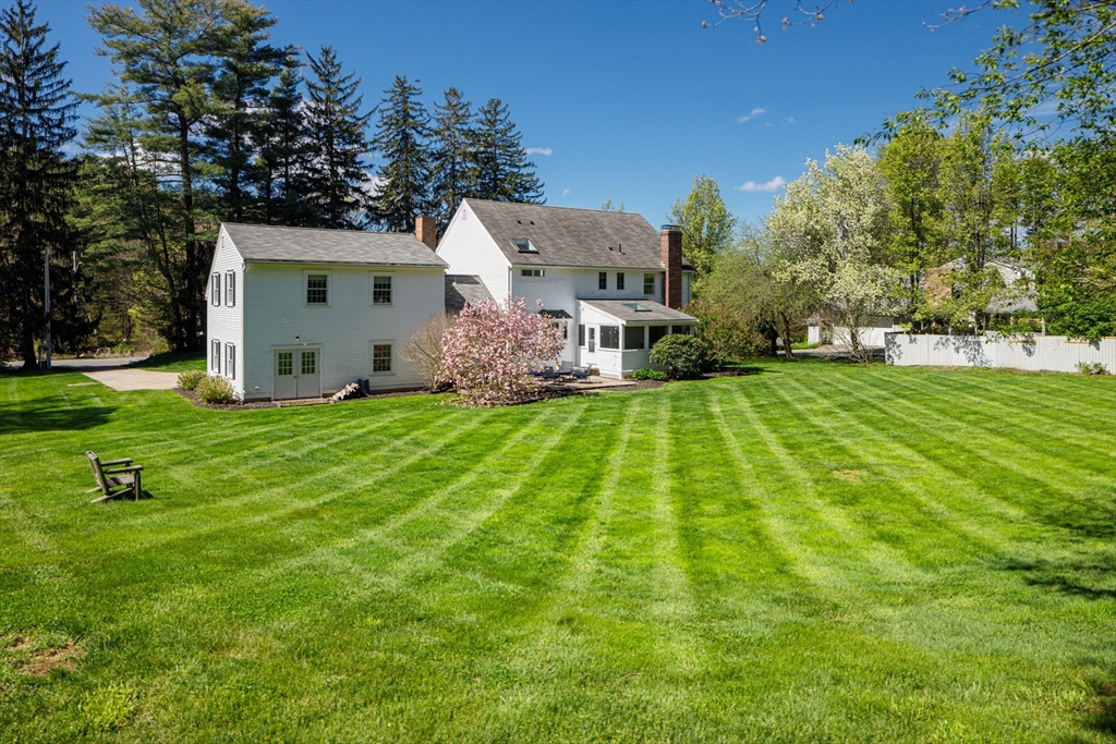 53 South Hampton Road Amesbury, MA 01913 - Photo 3 of 39 a view of a house with a big yard and large tree