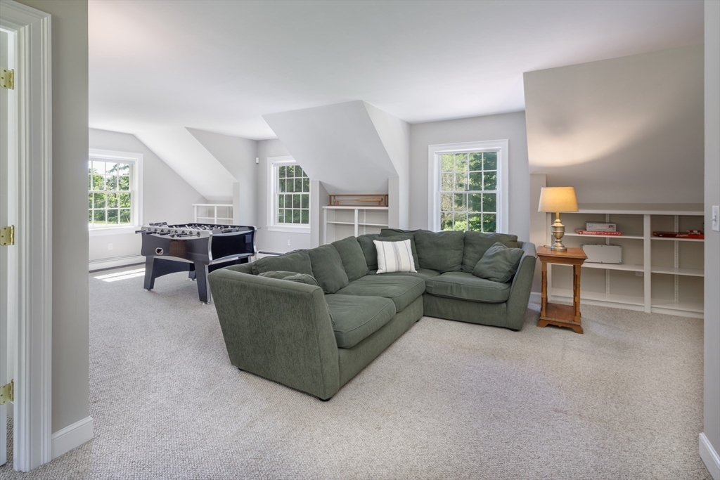 53 South Hampton Road Amesbury, MA 01913 - Photo 34 of 39 a living room with furniture and a window