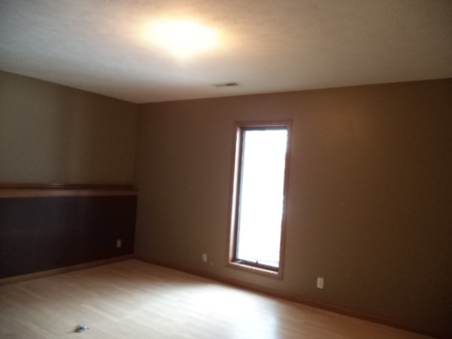 17529 Burr Oak Road Capron, IL 61012 - Photo 13 of 21 an empty room with a window