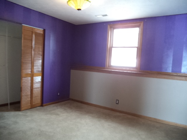 17529 Burr Oak Road Capron, IL 61012 - Photo 14 of 21 an empty room with a window