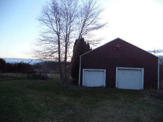 17529 Burr Oak Road Capron, IL 61012 - Photo 19 of 21 a backyard of a house with lots of green space