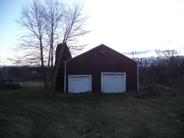 17529 Burr Oak Road Capron, IL 61012 - Photo 20 of 21 a house that has tree in front of it