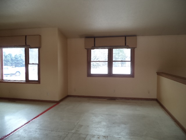 17529 Burr Oak Road Capron, IL 61012 - Photo 6 of 21 an empty room with a window