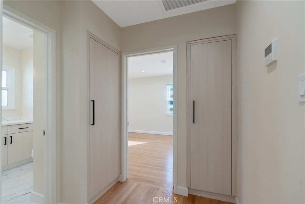 3054 North Frederic Street Burbank, CA 91504 - Photo 13 of 21 a view of a bathroom with a glass door
