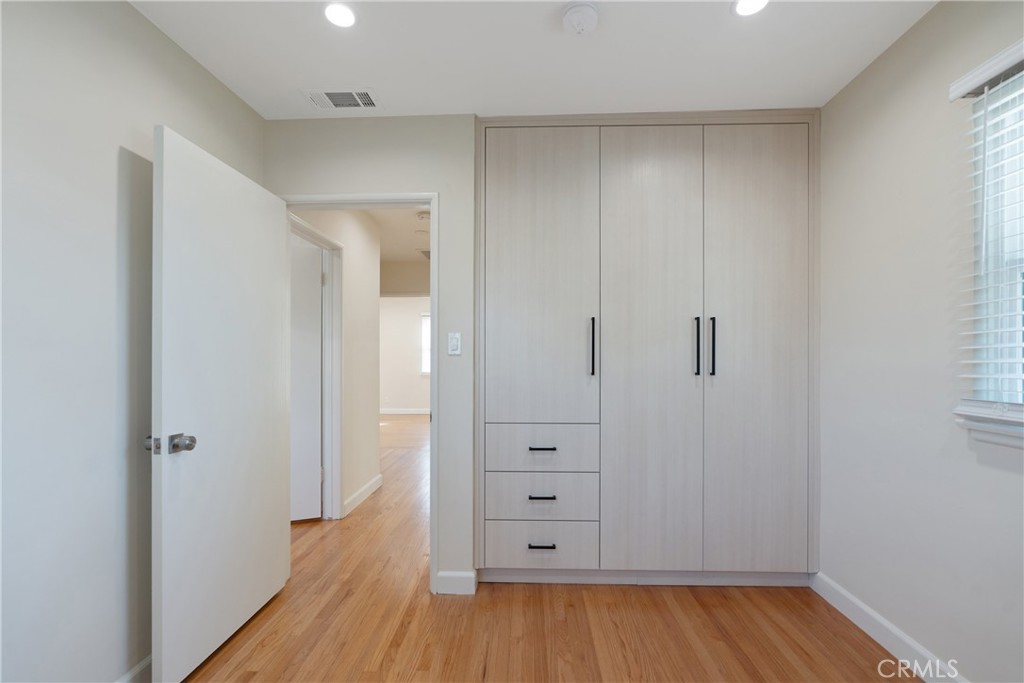3054 North Frederic Street Burbank, CA 91504 - Photo 17 of 21 wooden floor in an empty room