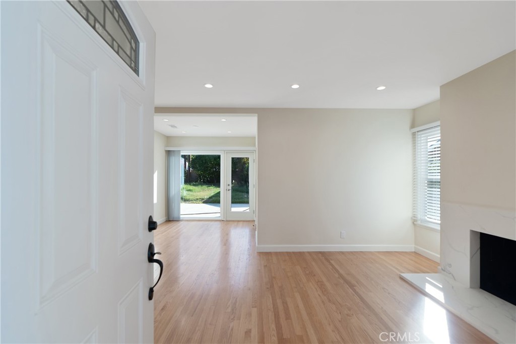 3054 North Frederic Street Burbank, CA 91504 - Photo 3 of 21 a view of a room with wooden floor and garden