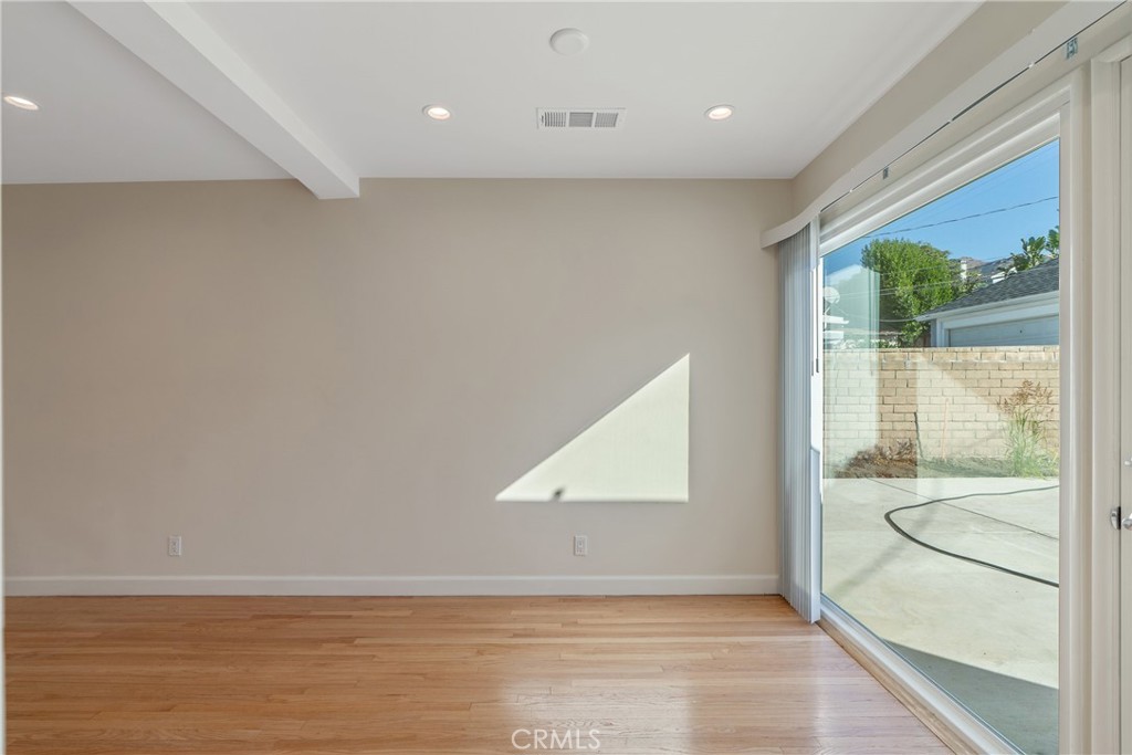 3054 North Frederic Street Burbank, CA 91504 - Photo 6 of 21 a view of an empty room with a window