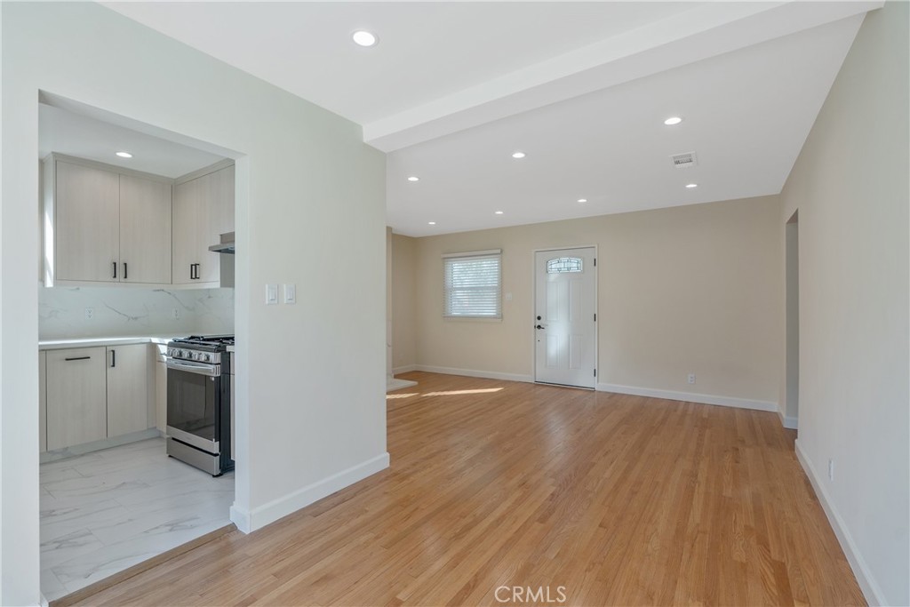 3054 North Frederic Street Burbank, CA 91504 - Photo 7 of 21 a view of a kitchen with a sink and a stove top oven