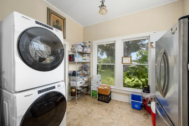 a view of livingroom with washer and dryer