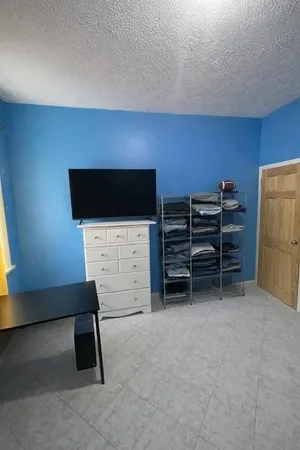 a view of a livingroom with furniture